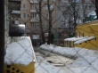 Дворы и крыши домов Саратова очищают от скопившейся наледи