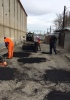 Продолжаются работы по ямочному ремонту на территории районов города